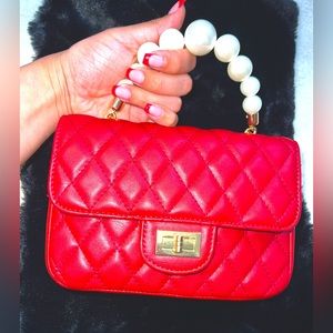Red crossbody purse with pearls